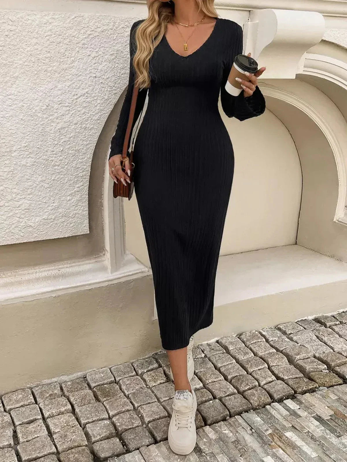 Sculpted Chic Midi Dress in black, featuring ribbed knit, bell sleeves, and a slim fit, perfect for casual outings or formal occasions.