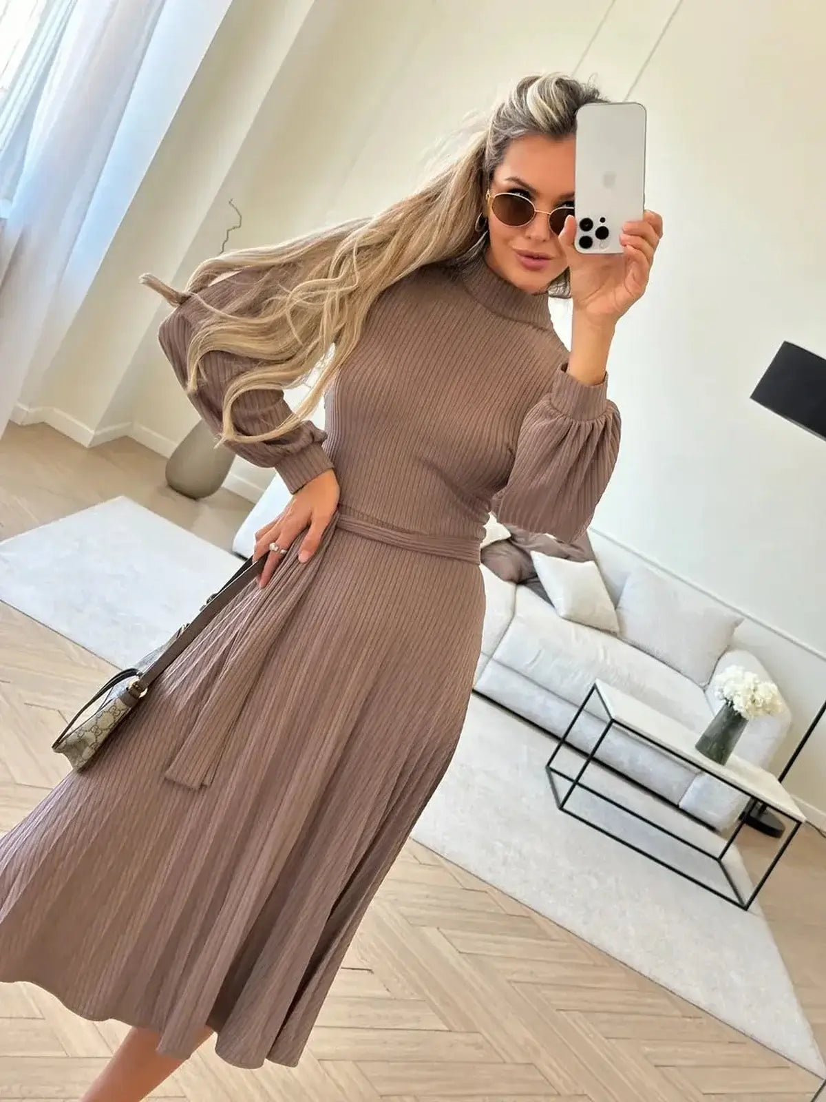 Plissé Charm Midi Dress in rich coffee hue with ribbed knit texture and pleated skirt, perfect for elegant occasions.