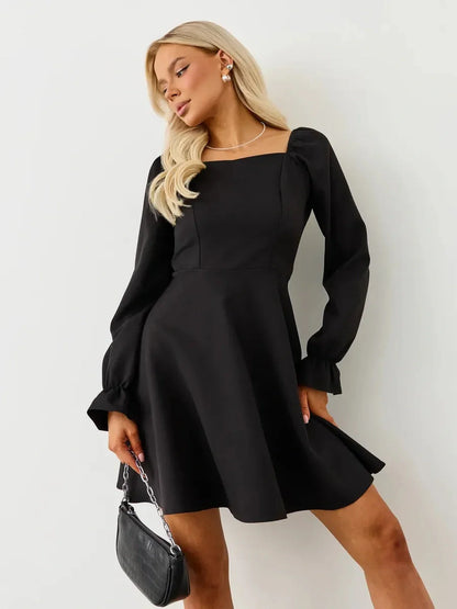 Velvet Hour Mini Dress in black, featuring a square neckline and romantic long sleeves, ideal for weddings and formal occasions.