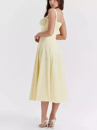 Sunlace Midi Dress in soft yellow, showcasing a corset bodice and flowing A-line skirt, perfect for summer occasions.