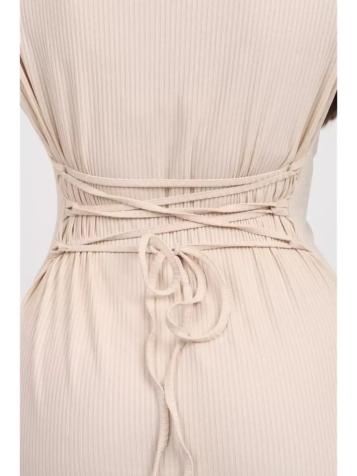 Stylish back view of the Ivory Flow Midi Dress featuring a tied waist detail, showcasing its ribbed texture and elegant design.