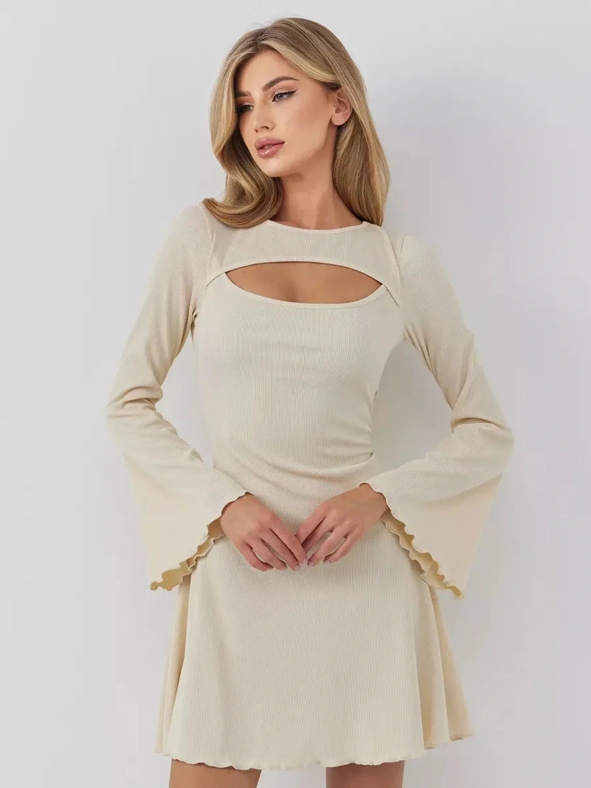 Sculpted Grace mini dress featuring a boat neckline and front cutout, perfect for weddings and formal events.