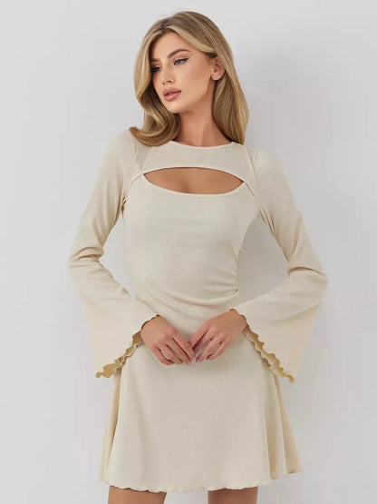 Sculpted Grace mini dress featuring a boat neckline and front cutout, perfect for weddings and formal events.