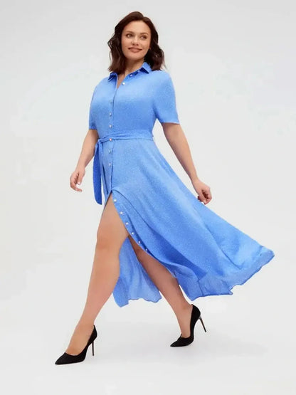 Light blue Skyline Dot Midi Dress with buttons and adjustable waist, perfect as a summer dress or for weddings and graduations.