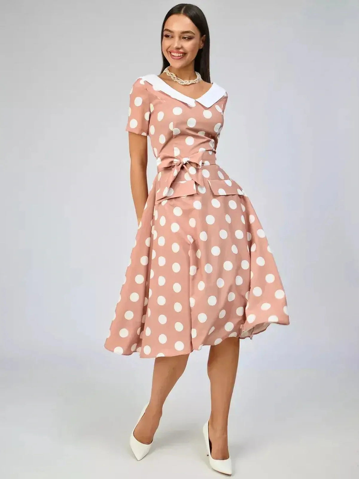 Vintage Muse Midi Dress featuring polka dots and a stylish white collar, perfect for summer gatherings or formal events.