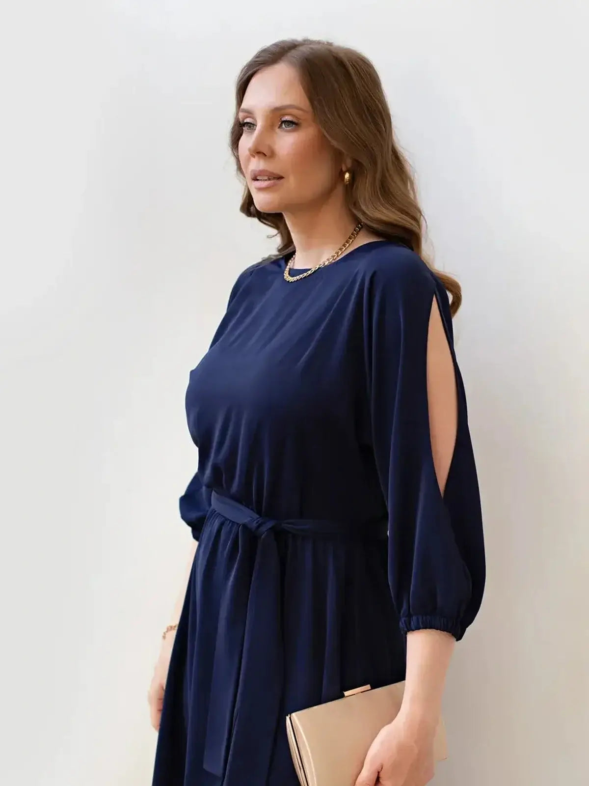 Noir Grace Midi Dress featuring elegant shoulder cutouts, perfect for summer weddings and formal occasions.