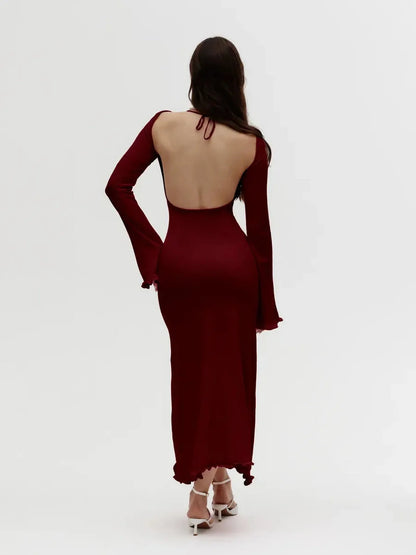 Elegant ruffle-back midi dress in burgundy, featuring an open back and long sleeves, perfect for weddings and formal events.