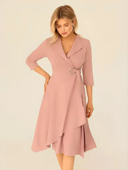 Blush Charm Midi Dress featuring a wrap silhouette and asymmetric hemline, ideal for weddings and formal events.