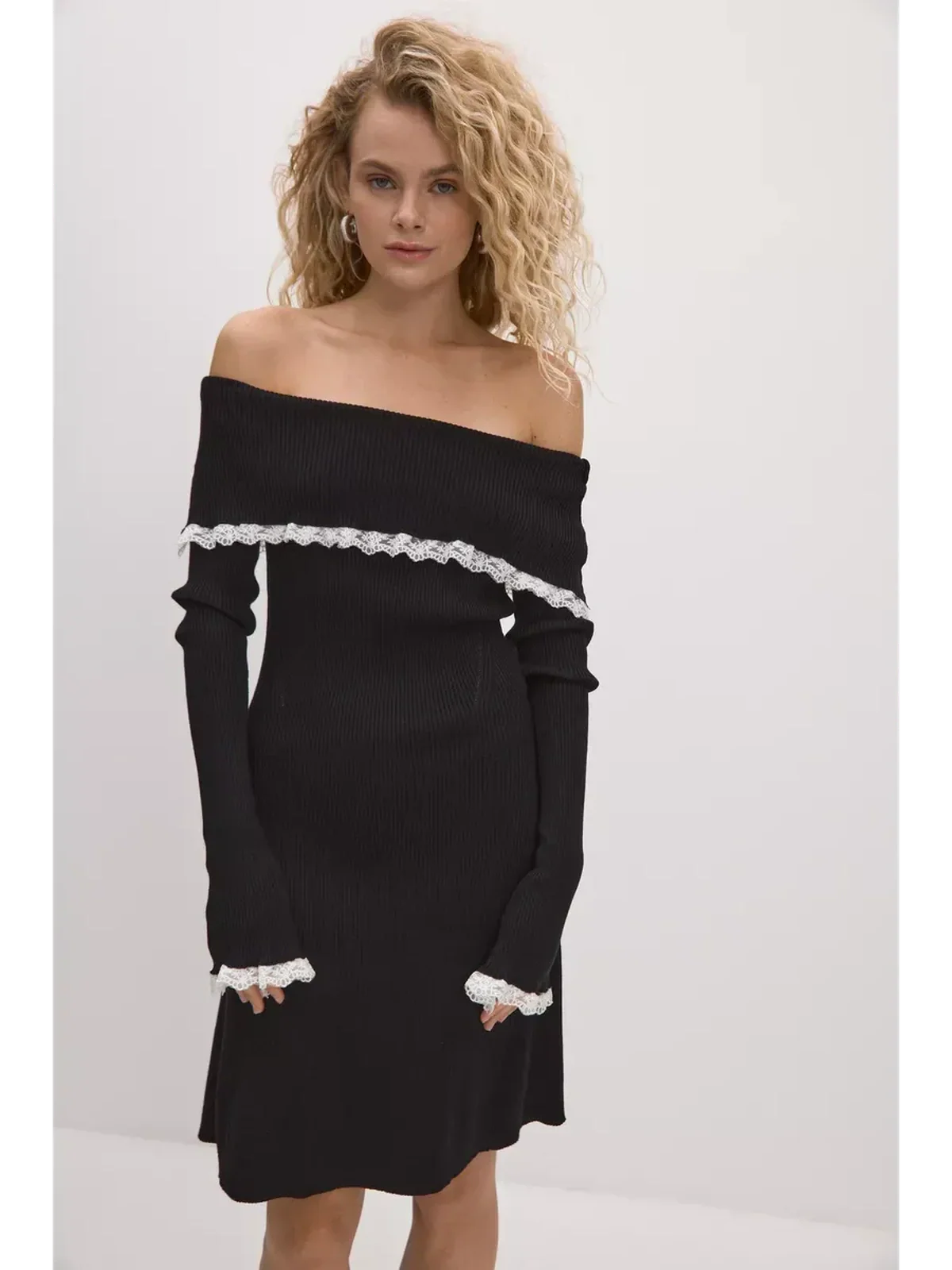 Lace Off-Shoulder Mini Dress in black, featuring ribbed knit and white lace trims, elegant for weddings and formal occasions.