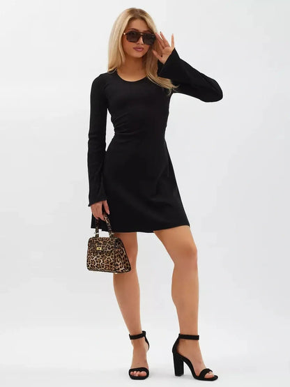 Noir Flare Mini Dress featuring long flared sleeves, a tie waist, and elegant black knit design, perfect for versatile styling.