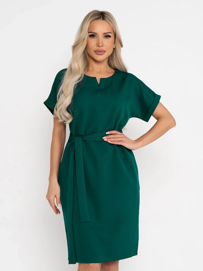 Emerald Mode green mini dress with notched neckline and belted waist, perfect for summer, weddings, and special occasions.