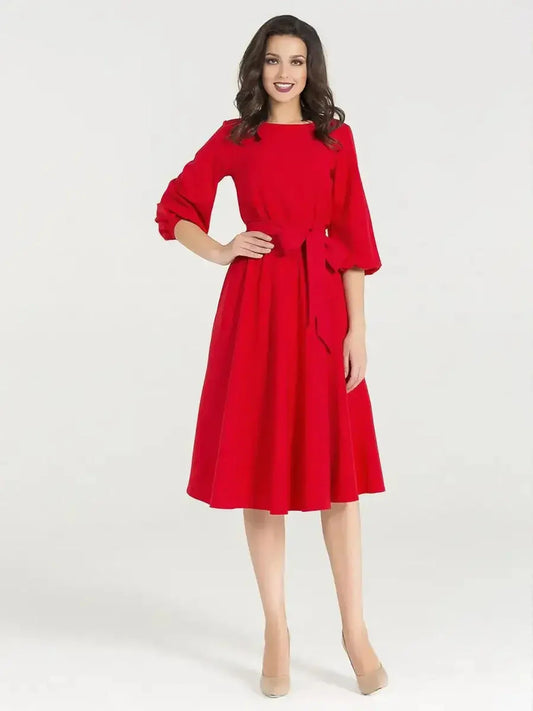 Scarlet Poise Midi Dress featuring balloon sleeves and a flattering A-line silhouette, perfect for weddings or special occasions.