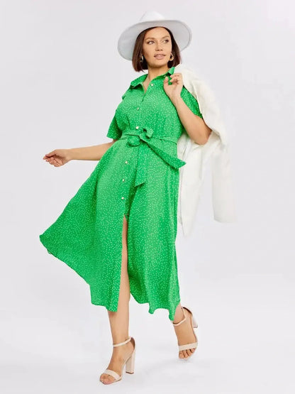 Vivid green Garden Dot Midi Dress with white dots, button-down style, tie waist, and A-line cut, ideal for summer and casual occasions.