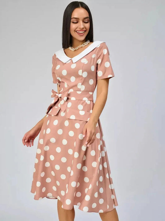 Vintage Muse Midi Dress featuring polka dots and a white collar, perfect for weddings, summer gatherings, and elegant occasions.