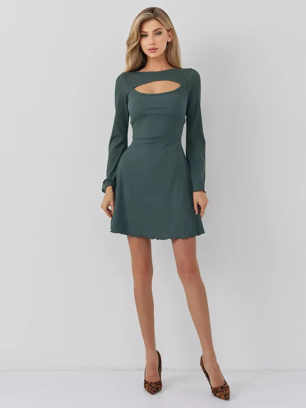 Dark olive mini dress with long sleeves and cut-out neckline, perfect for formal events or as a stylish cocktail dress.