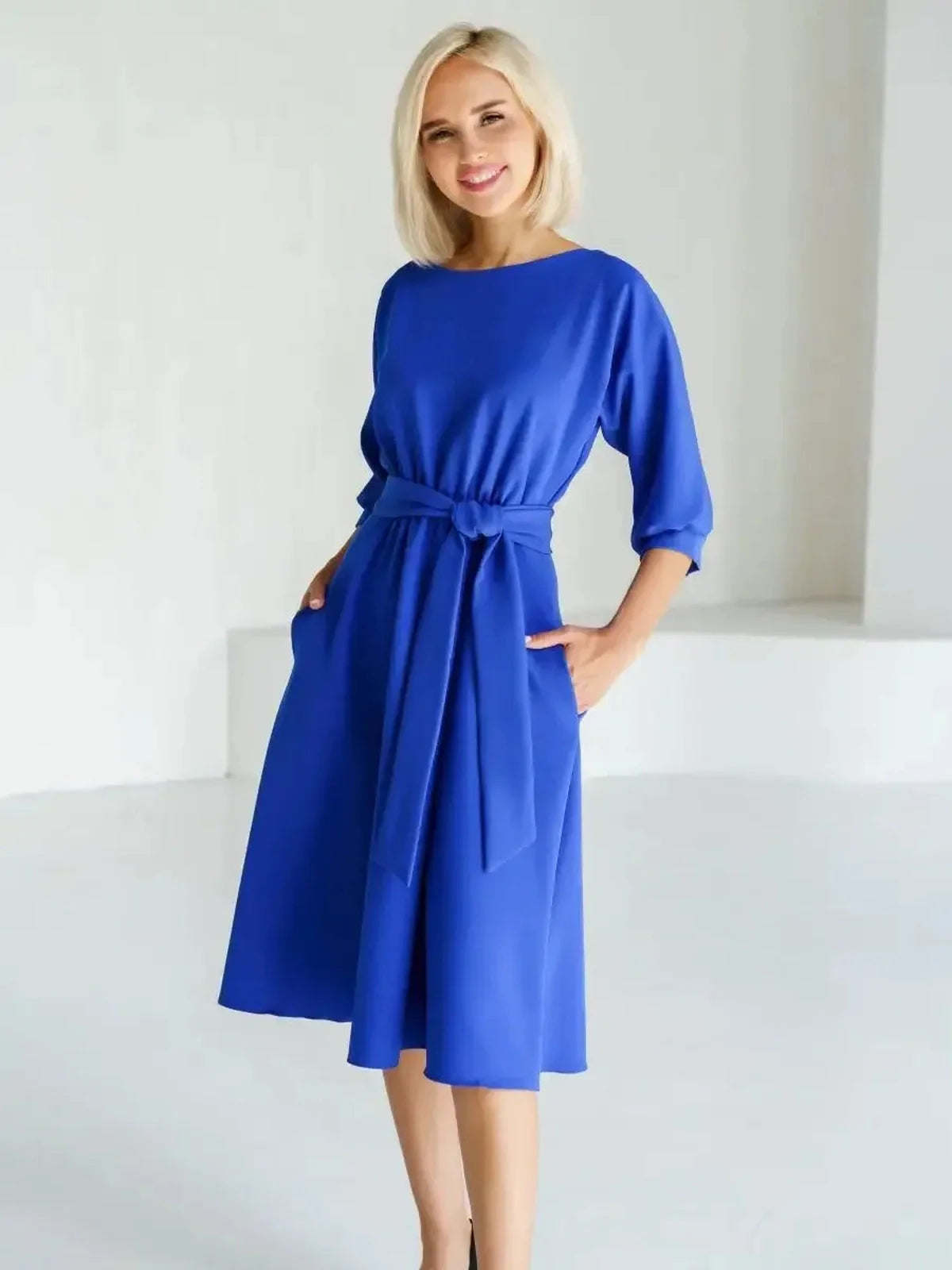 Sapphire belted midi dress showcasing a sleek silhouette with pockets, ideal for weddings, parties, and formal occasions.