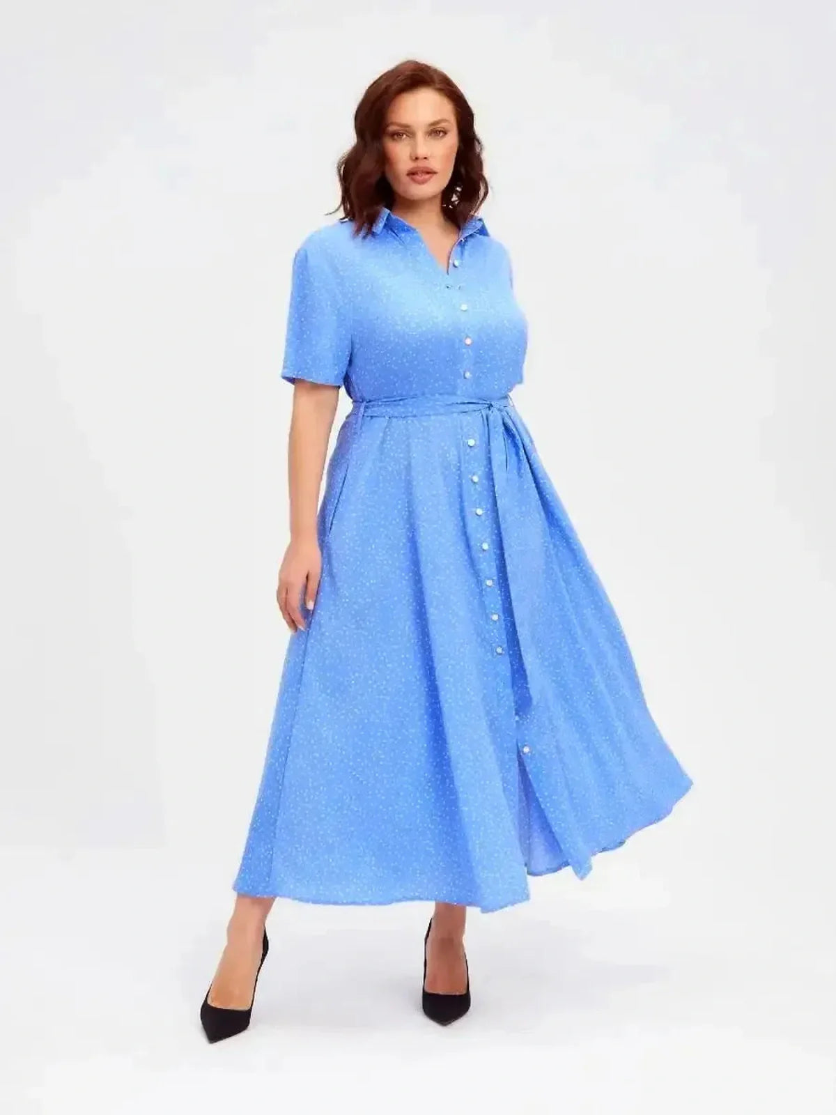 Skyline Dot Midi Dress in light blue, featuring white polka dots, a V-neckline, and flowing A-line silhouette.