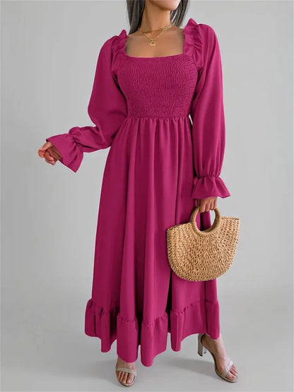 Roselle Midi Dress in bold magenta with smocked bodice, ruffled neckline, perfect for weddings or casual outings.