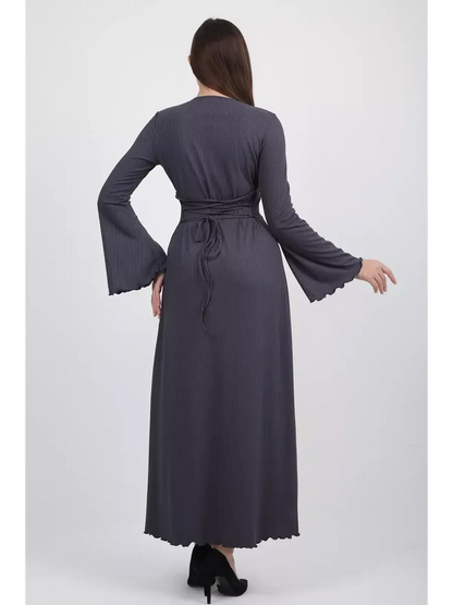 Back view of the Twilight Curve Midi Dress in charcoal grey, featuring flared sleeves and a tie waist for an elegant silhouette.