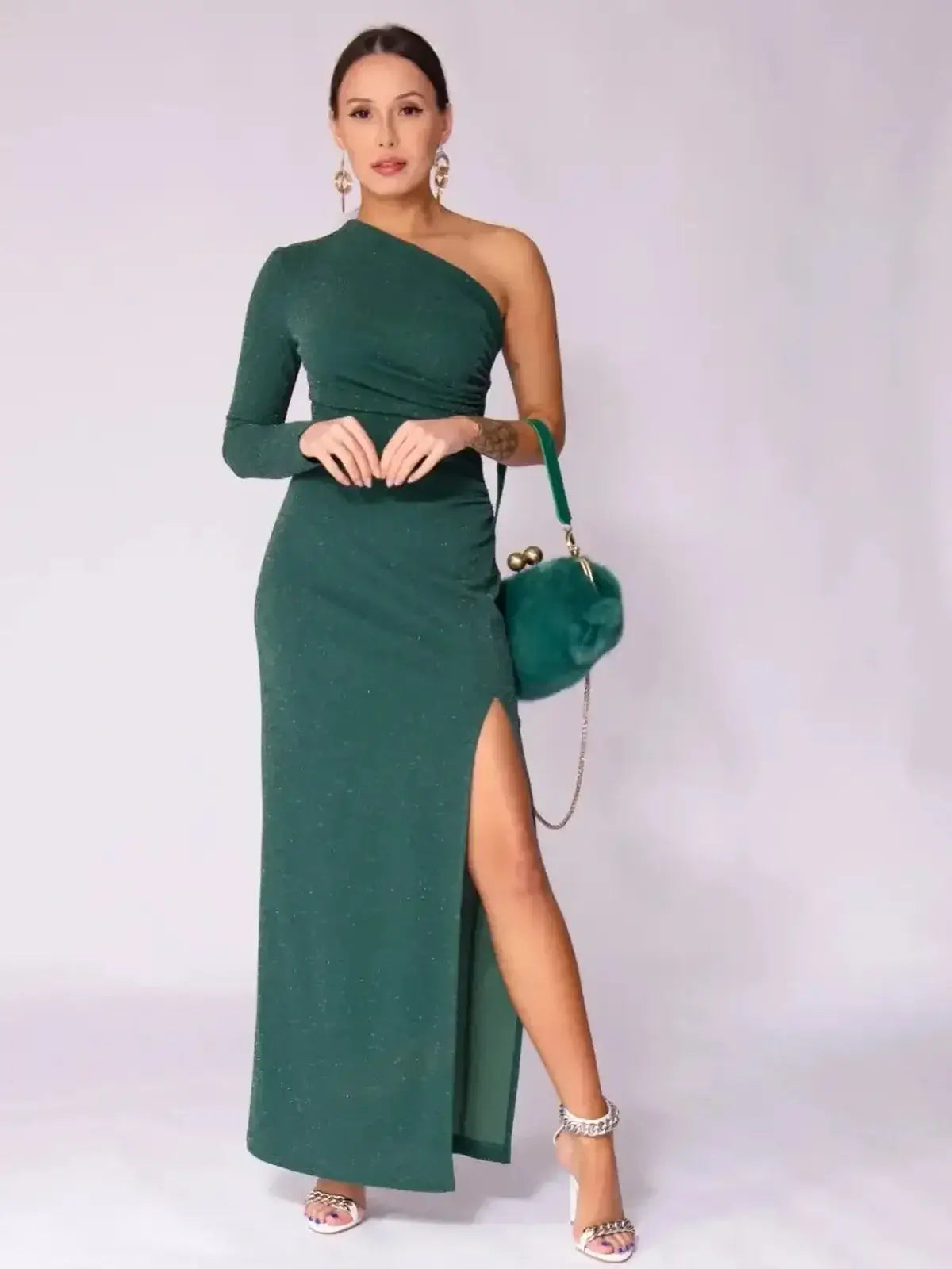 Emerald Spark Maxi Dress featuring a one-shoulder design, high slit, and shimmering fabric, ideal for weddings and formal occasions.