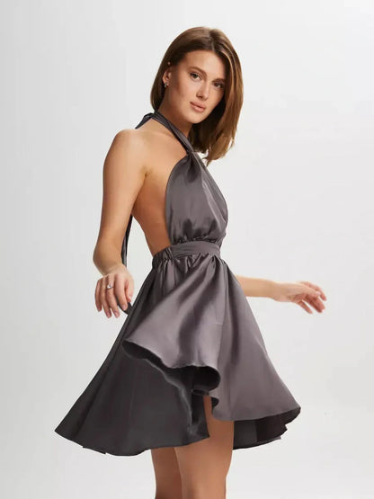 Elegant satin mini dress with plunging V-neckline and halter tie-back, perfect for weddings and formal events.