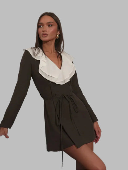 Chic Flair Mini Dress featuring a dark brown silhouette with a white cascading collar, perfect for formal and casual occasions.