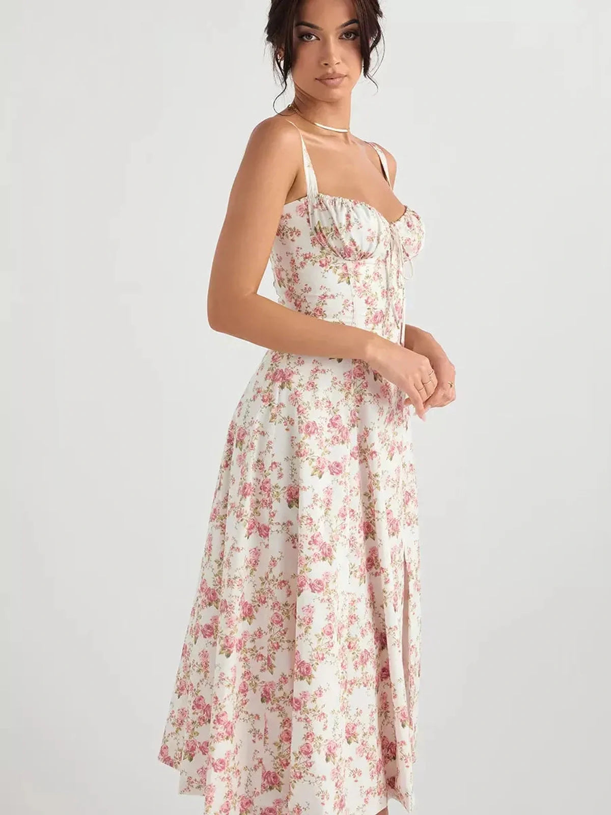 Rose Garden Midi Dress featuring floral print, sweetheart bust, and flowy A-line skirt—ideal for summer events and weddings.