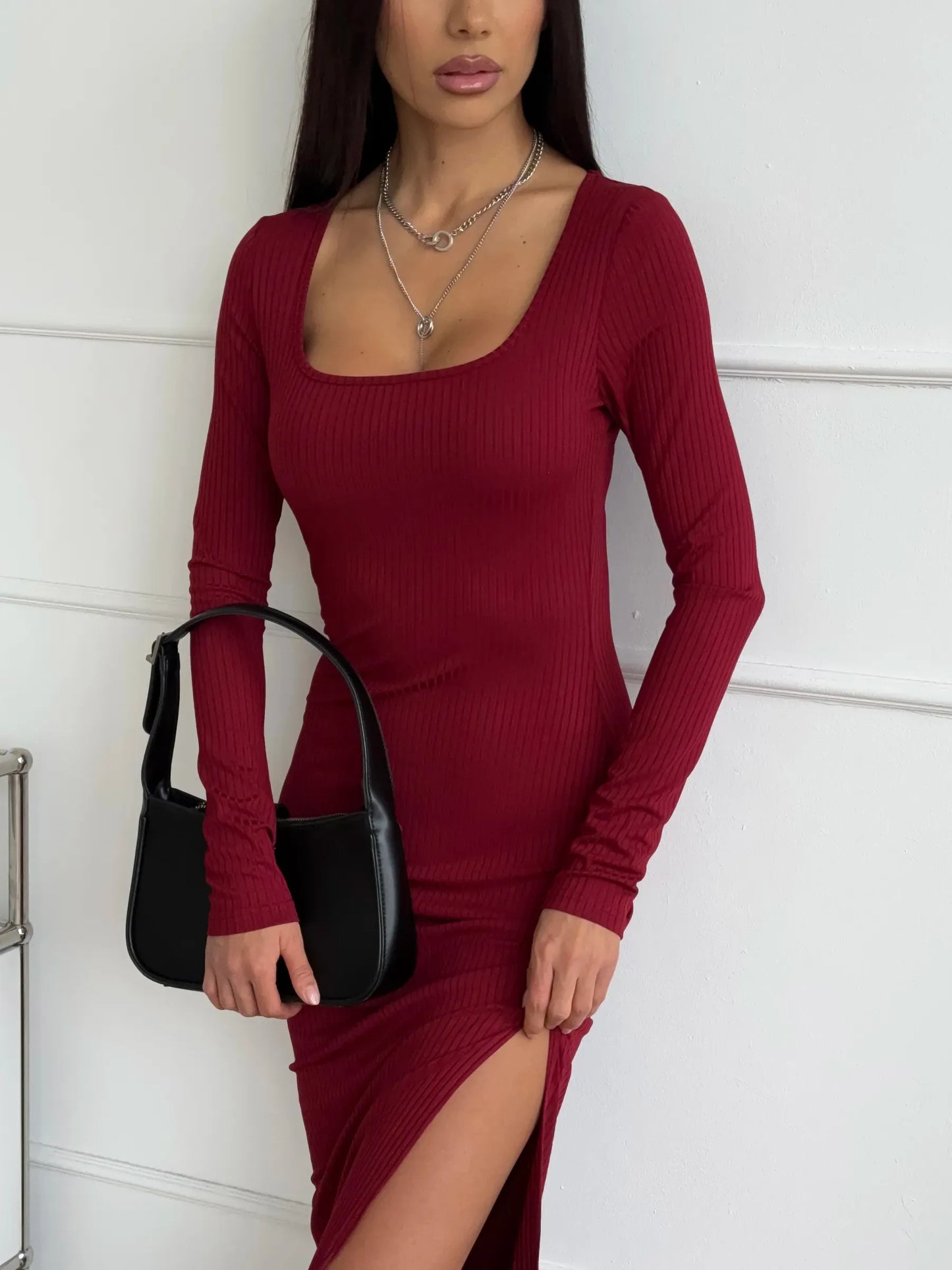 Model showcasing the Ribbed Grace Midi Dress in burgundy with a square neckline and side slit, perfect for summer and special occasions.