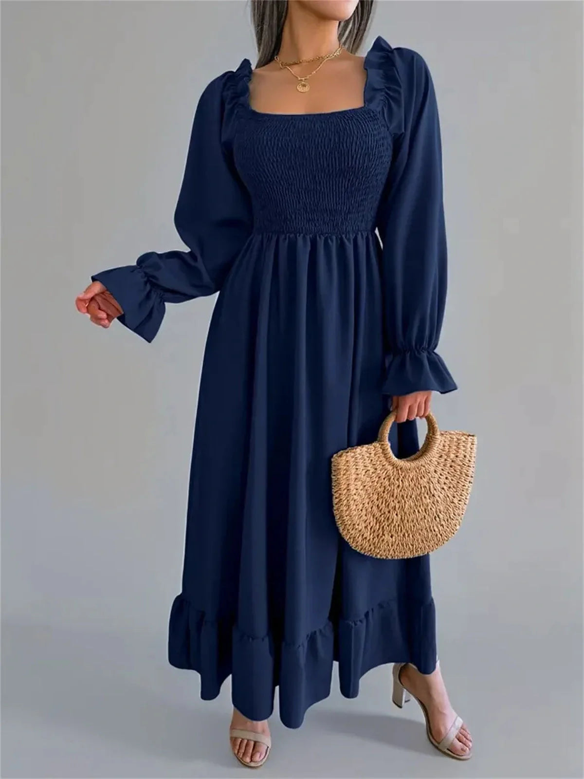Navy blue midi dress with smocked bodice and flounce hem, perfect for weddings, brunch, or casual outings.