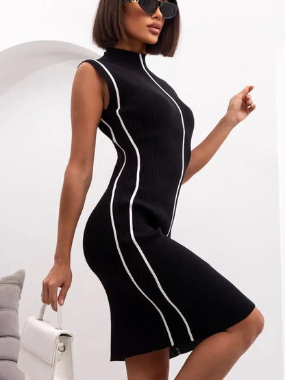 Sculpted Edge Midi Dress in black with contrast piping, ideal for formal events and summer occasions.