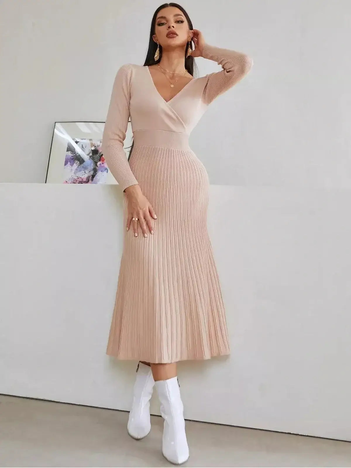 Blush Grace Midi Dress in soft pink, featuring a wrap-effect bodice and pleated skirt, perfect for weddings or formal occasions.