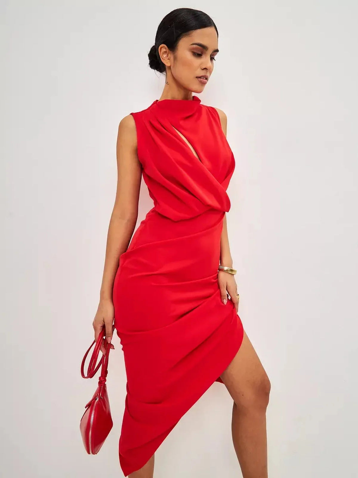 Red drape maxi dress with a stylish neckline, perfect for formal events and weddings, showcases elegance and confidence.