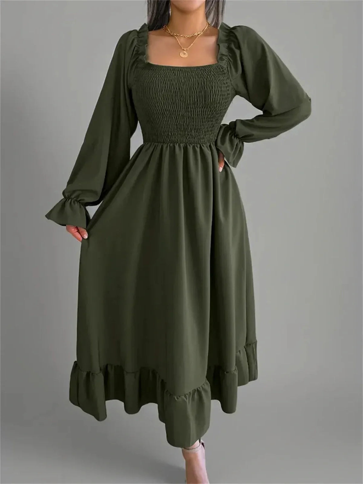 Ruffle Charm Midi Dress in olive green, featuring a smocked bodice and long sleeves, perfect for weddings and casual outings.