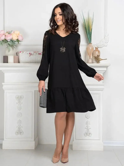 Elegant black dress with sheer floral lace sleeves, perfect for weddings, cocktail events, or casual outings.