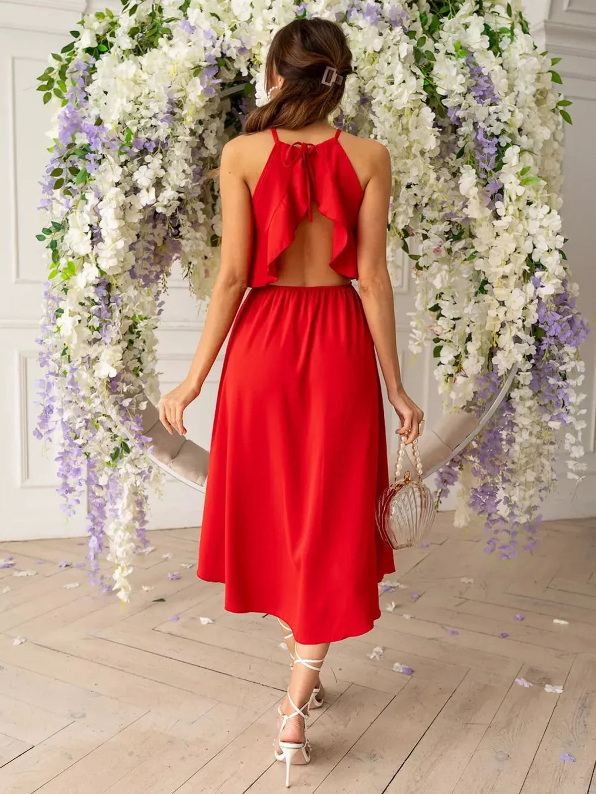 Radiance Midi Dress in vibrant red with halter-neck and ruffled back, perfect for summer weddings and special occasions.