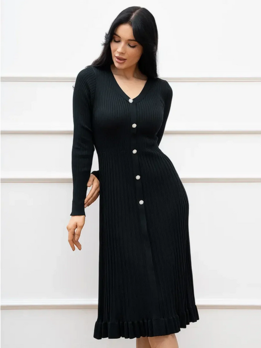Orchid Knit Midi Dress in black, featuring ribbed texture, crystal buttons, and a ruffled hem, perfect for formal or casual wear.