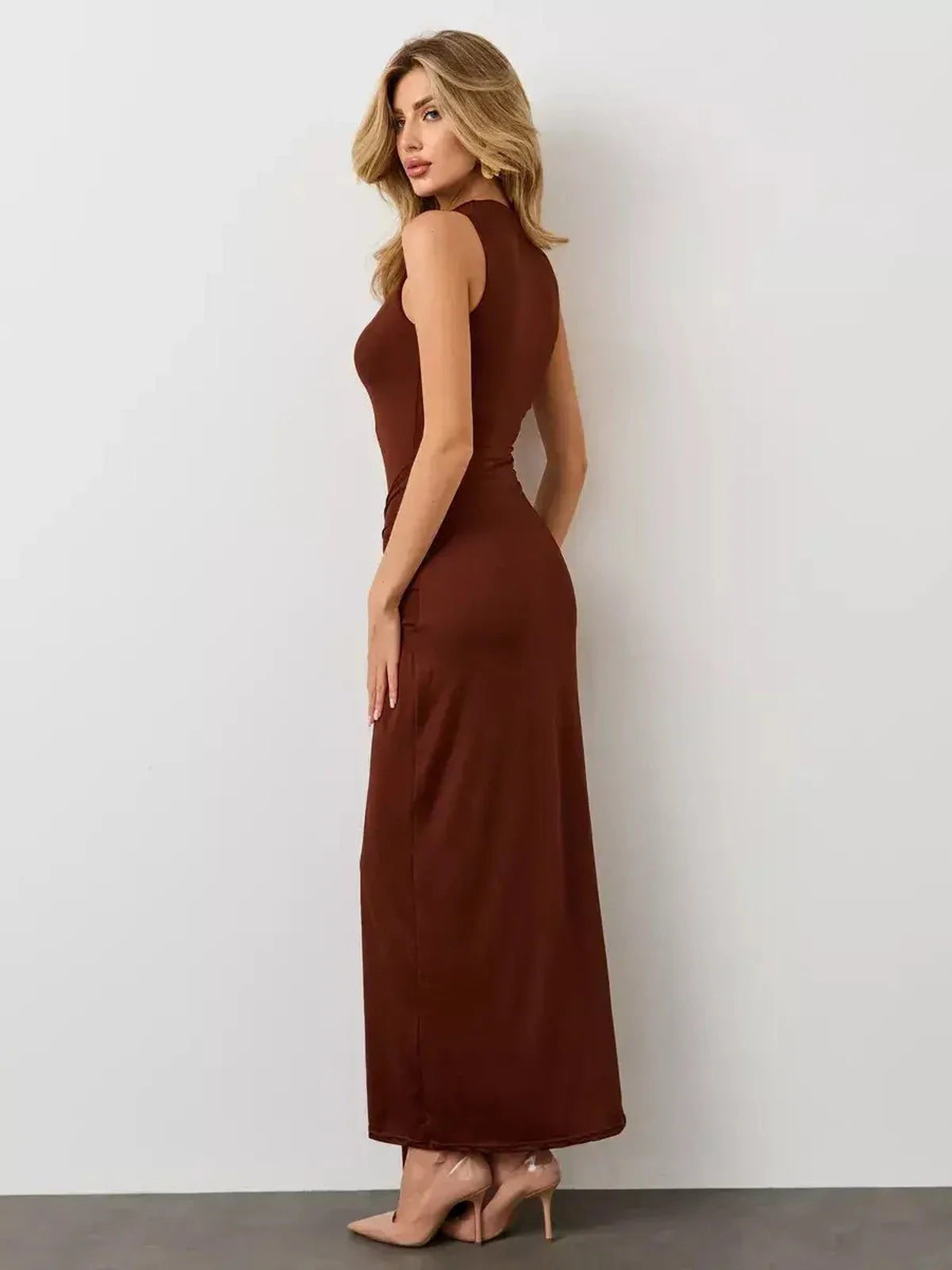 Mocha Muse Maxi Dress featuring a sculptural fit and elegant draping, perfect for formal events and wedding guests.