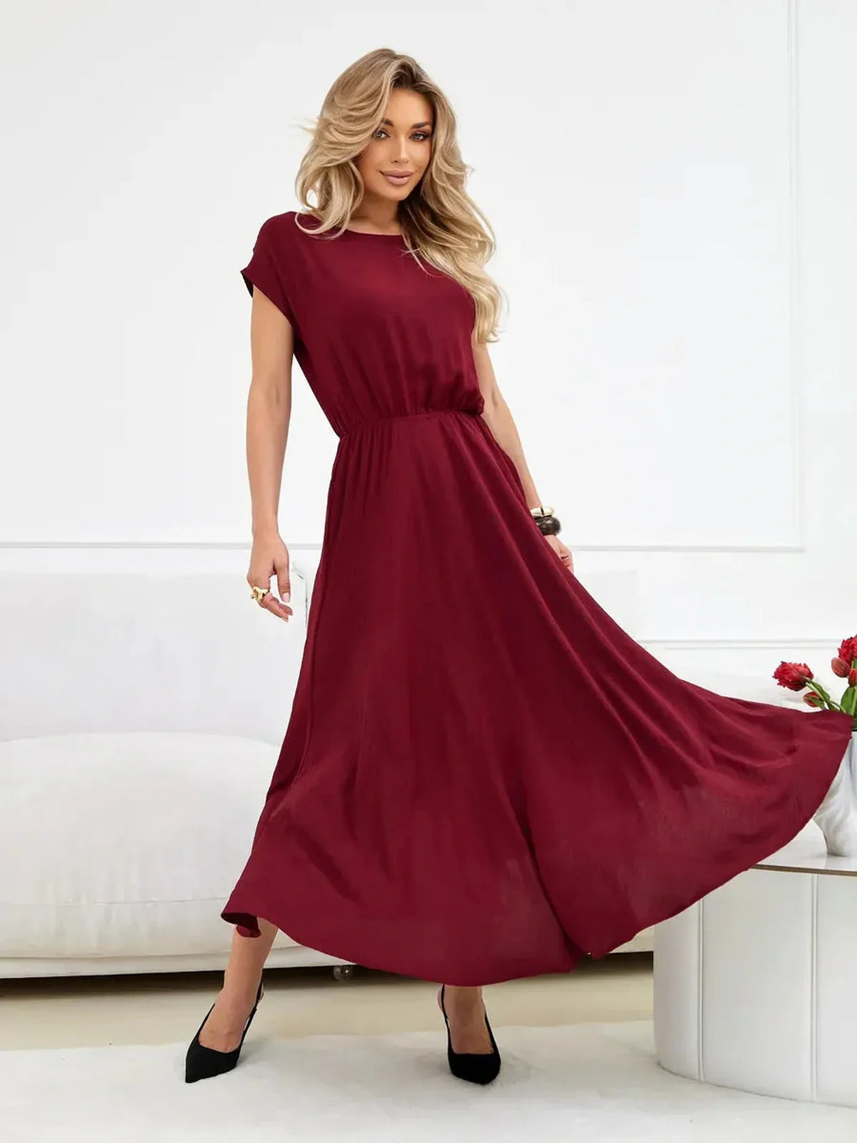 Sculpted Ease Maxi Dress in deep burgundy, featuring a cinched waist and flowing skirt, perfect for summer and formal occasions.