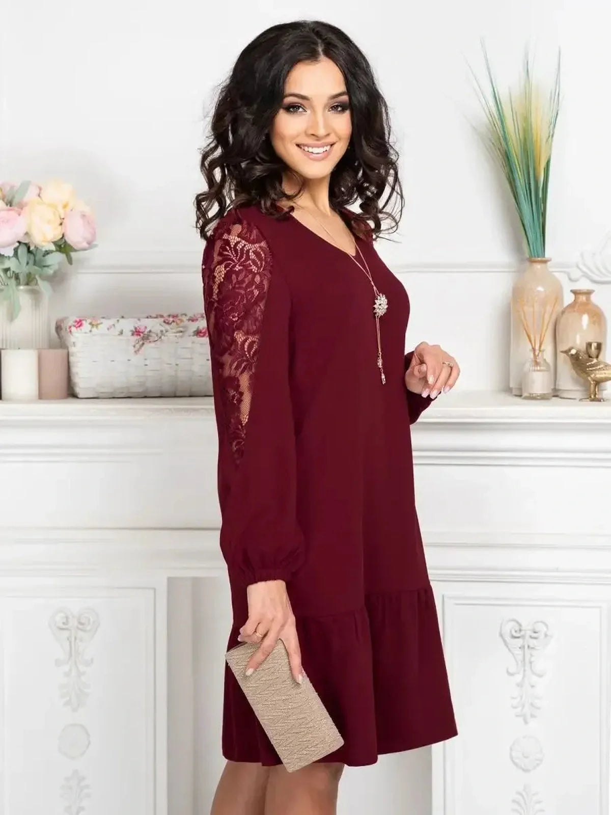 Lace Ruby mini dress in deep cherry with lace sleeves and ruffle hem, perfect for weddings and formal events.