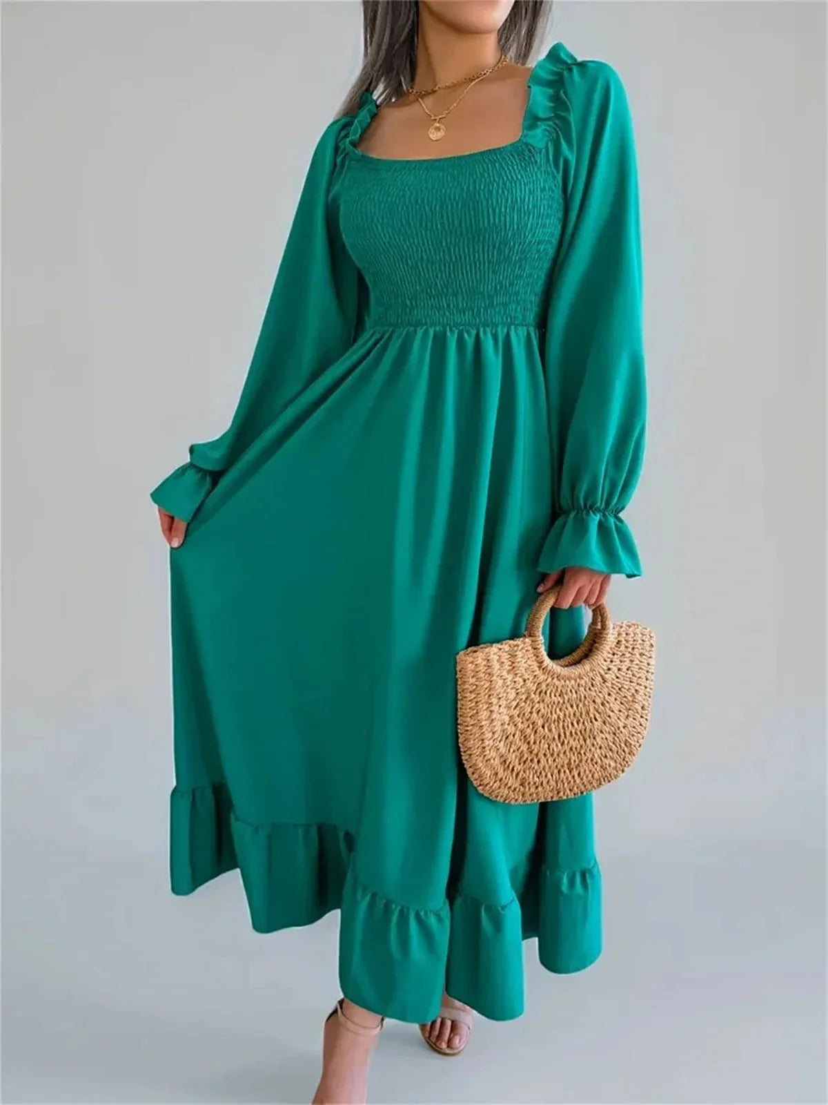 Meadow Ruffle Midi Dress in rich green, featuring a smocked bodice and flowing skirt, perfect for summer and special occasions.