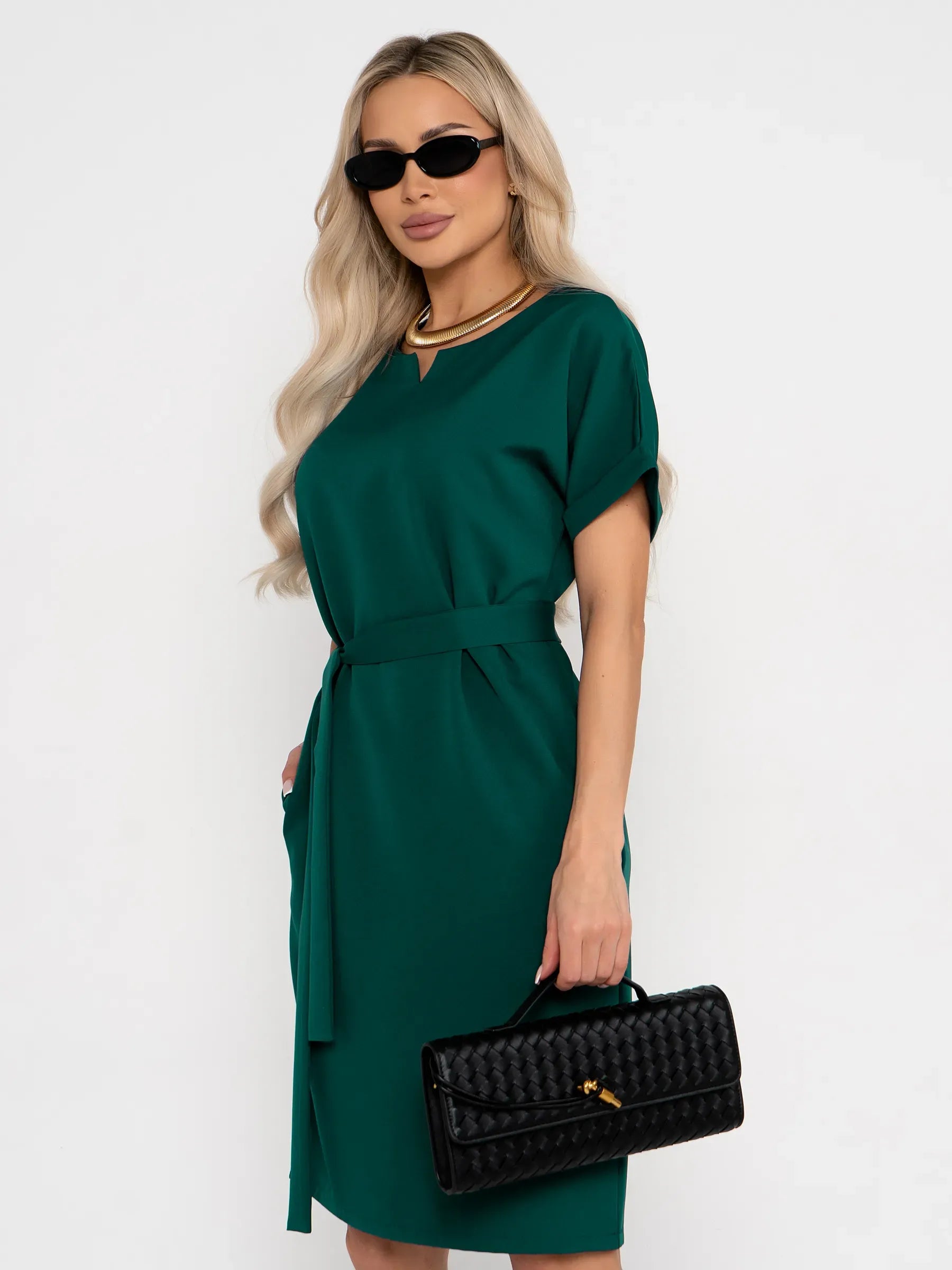 Emerald Mode mini dress featuring cuffed sleeves, waist belt, and elegant neckline, perfect for summer and formal events.