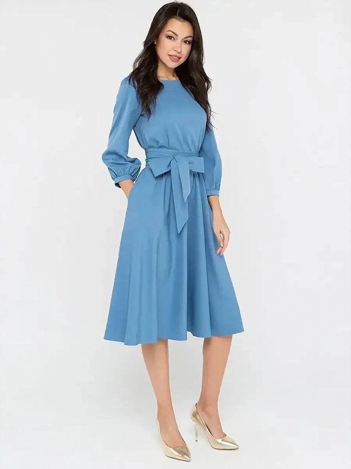 Sky Belle Midi Dress in soft blue, featuring a self-tie belt, 3/4 puff sleeves, and functional in-seam pockets.