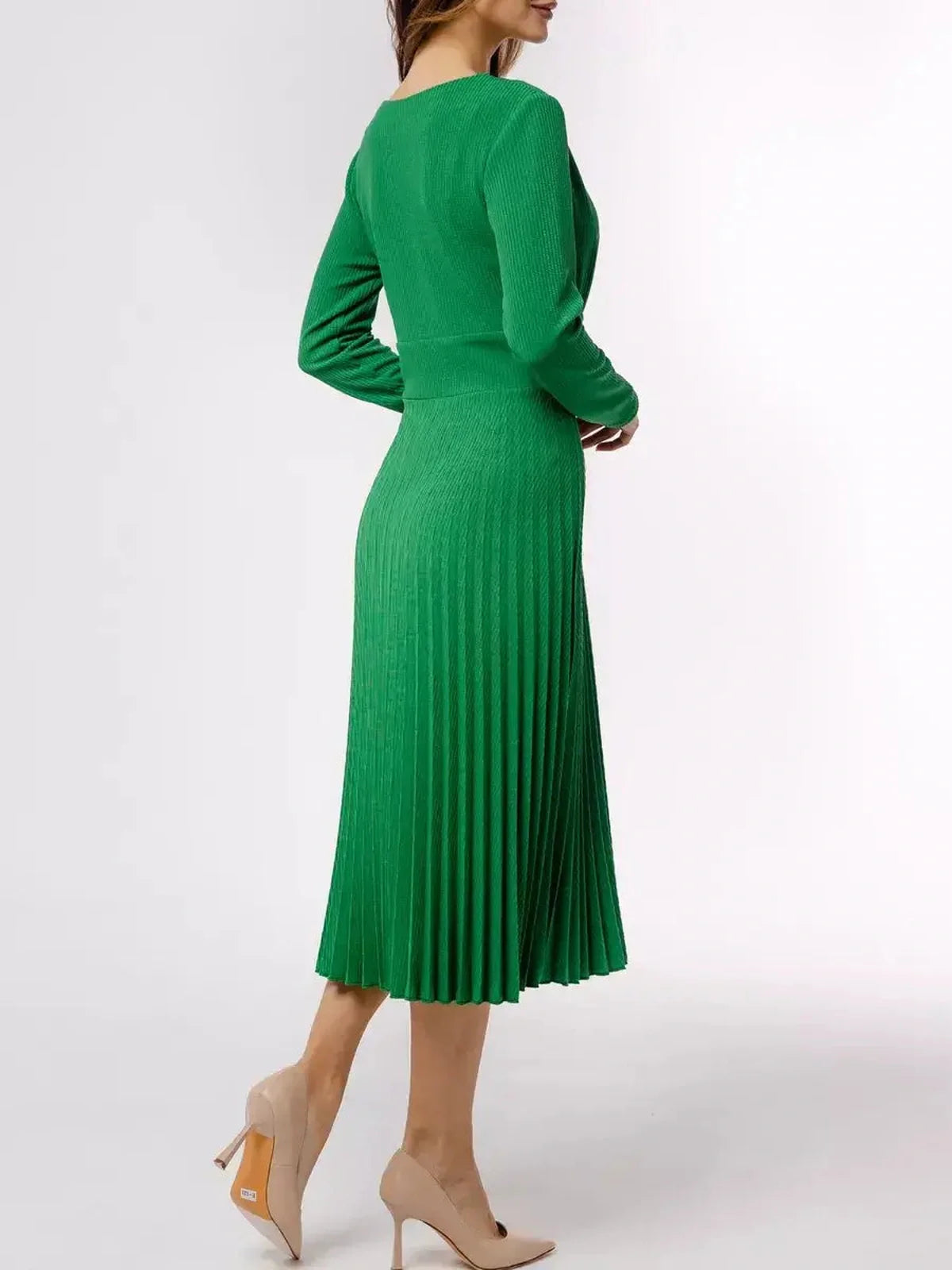 Emerald Grace Midi Dress viewed from behind, featuring long sleeves and a pleated skirt, styled with nude heels.