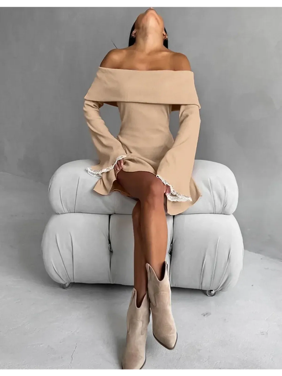 Off-shoulder Muse Mini Dress with flared sleeves, showcasing feminine flair and elegance, perfect for summer and formal occasions.