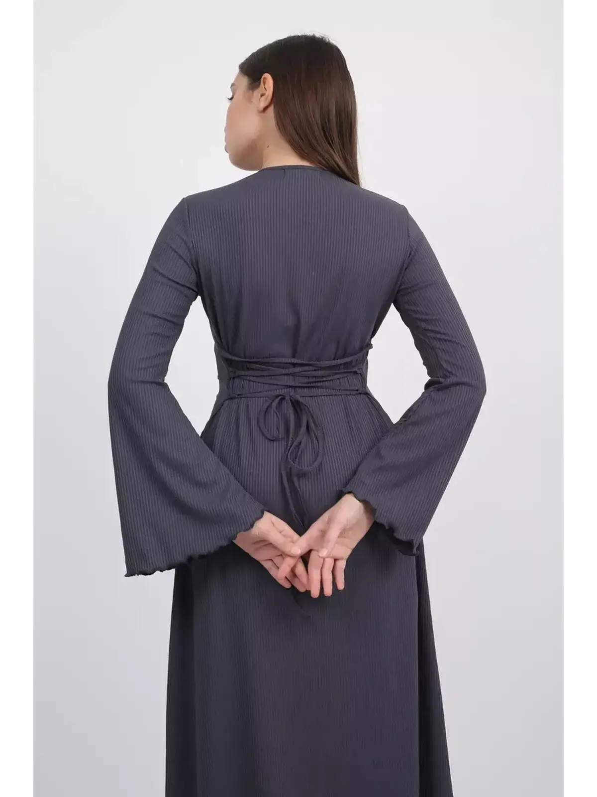 Back view of the Twilight Curve Midi Dress featuring flared sleeves and a tie waist in charcoal grey.