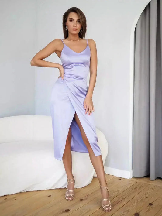 Elegant lilac midi dress with thigh-high slit and satin finish, perfect for weddings and summer celebrations.