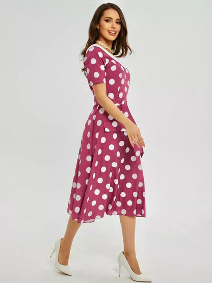 Retro Dot Midi Dress featuring a vibrant polka dot print and elegant white collar, perfect for summer events.