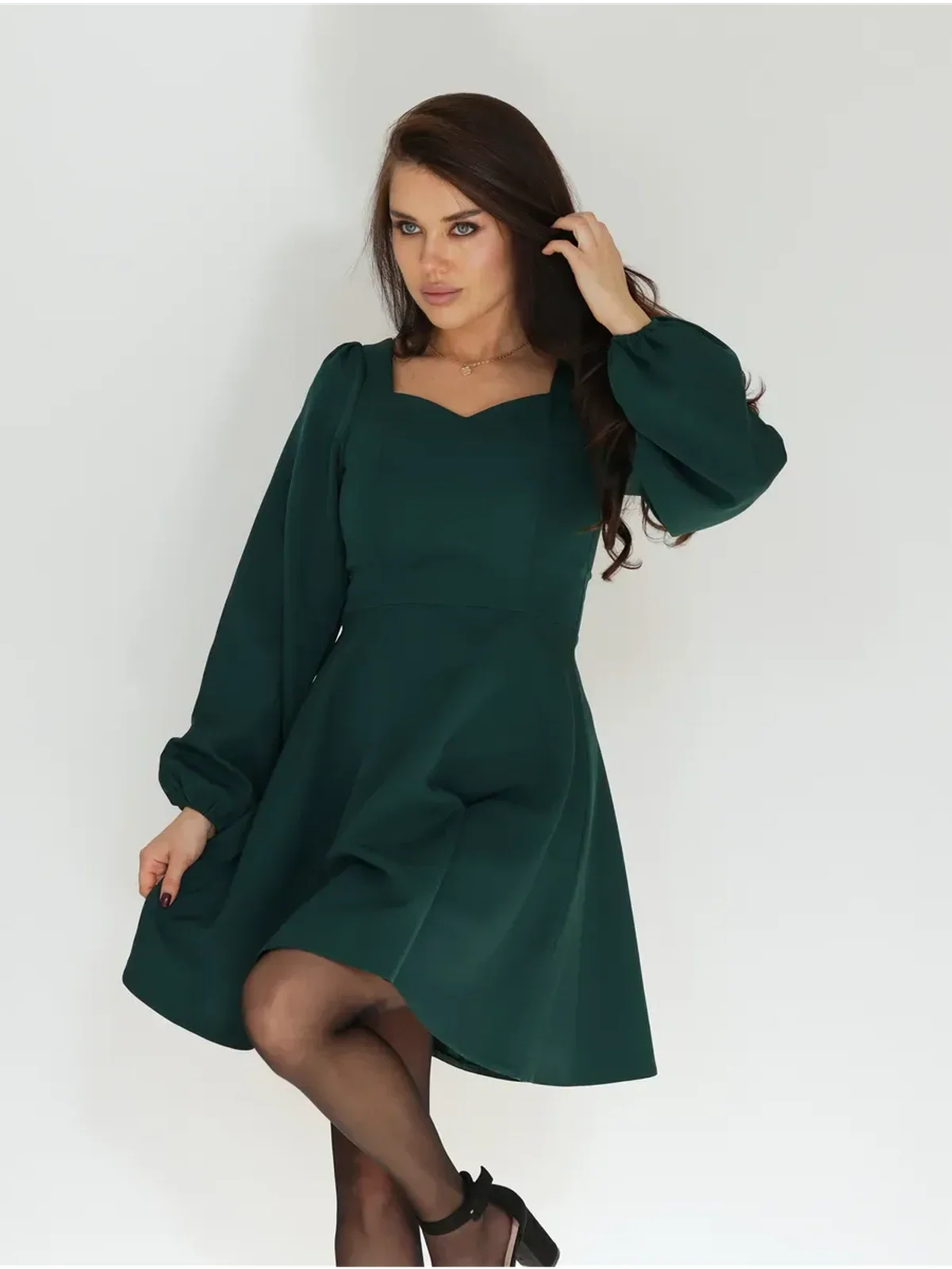 Emerald Grace mini dress with puff sleeves and sweetheart neckline, ideal for wedding guest, prom, or summer occasions.