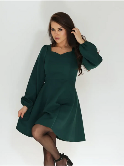 Emerald Grace mini dress with puff sleeves and sweetheart neckline, ideal for wedding guest, prom, or summer occasions.