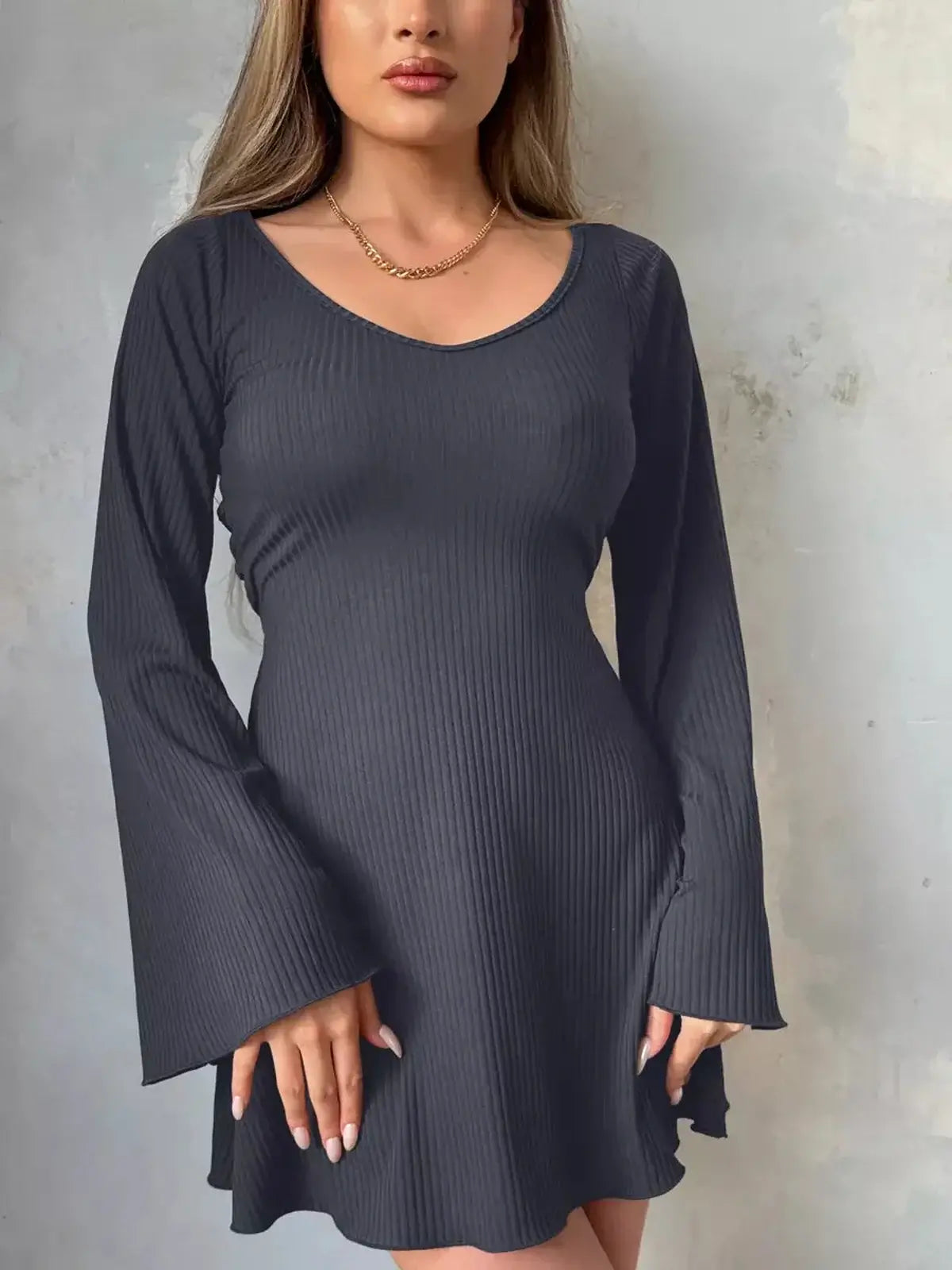 Elegant noir flare midi dress with bell sleeves and a flattering scoop neckline, perfect for formal or casual occasions.